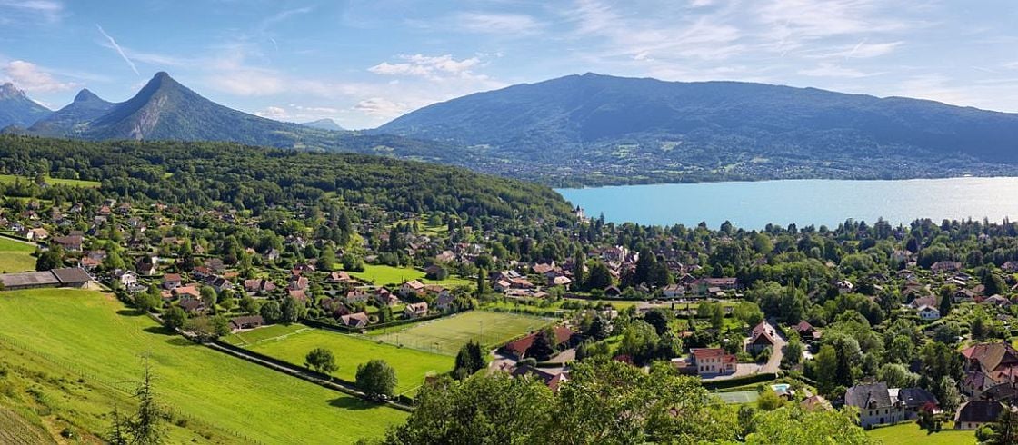 Scenic view of mountains and scattering houses from Menthon castle in Haute-Savoie 